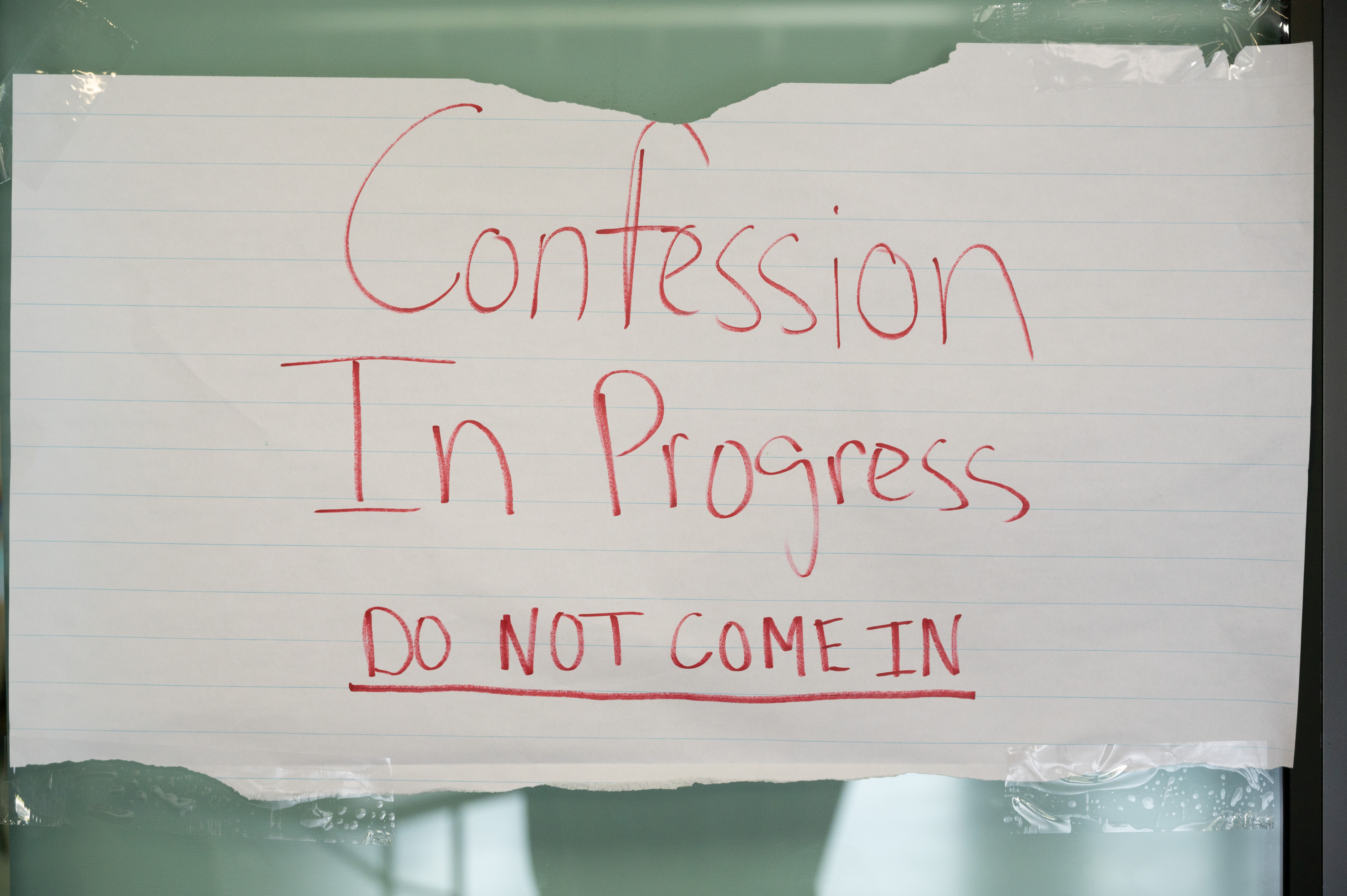 Confession in Progress sign