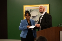 Seanette Culmer receives the Academic Leadership Award for Tapia College of Business from Dr. Zachary Smith
