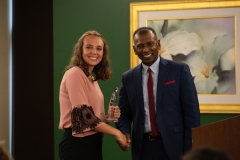 Victoria Budnar-Chapman receives Dean's Award for Excellence (TCOB) from Dr. Passard Dean
