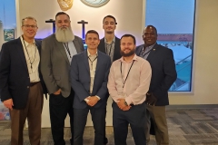 Dr.-Larry-Braue-and-student-veterans-at-the-2022-Military-Appreciation-event-