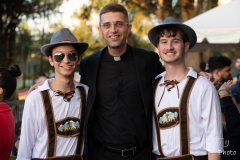 Father Randall and students at Oktoberfest