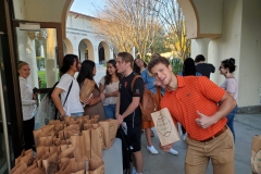 Students picking up their goodie bags