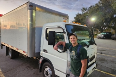 Adam-Keselicka-helps-with-transportation-of-items-to-Fort-Myers